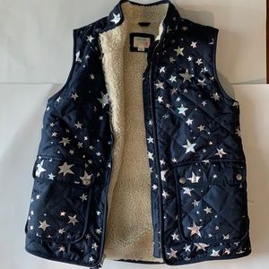 Navy blue vest with holographic silver stars